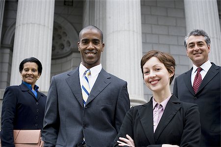 Portrait of lawyers in front of a courthouse Stock Photo - Premium Royalty-Free, Code: 640-02764721