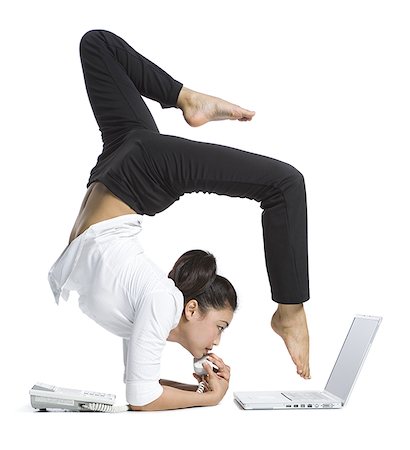 simsearch:640-01350266,k - Female contortionist businesswoman Foto de stock - Sin royalties Premium, Código: 640-02764840