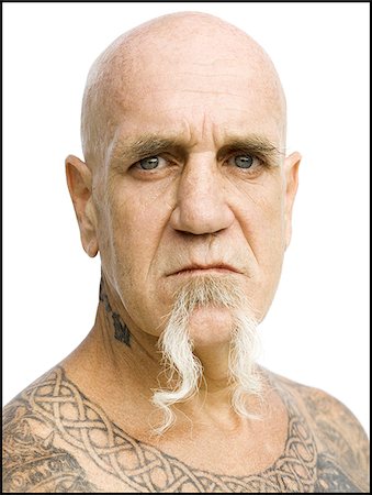 face man tatoo - Bald man with tattoos Stock Photo - Premium Royalty-Free, Code: 640-02764928