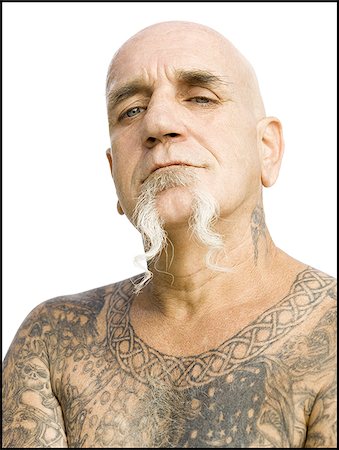 face man tatoo - Bald man with tattoos Stock Photo - Premium Royalty-Free, Code: 640-02764929