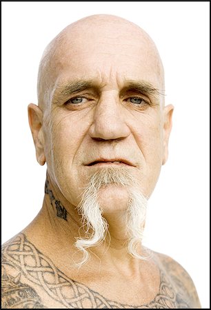 face man tatoo - Bald man with tattoos Stock Photo - Premium Royalty-Free, Code: 640-02764930