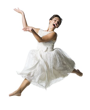 simsearch:640-03255436,k - Woman in white dress jumping Foto de stock - Sin royalties Premium, Código: 640-02764944