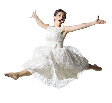 simsearch:640-03255436,k - Woman in white dress jumping Foto de stock - Sin royalties Premium, Código: 640-02764945