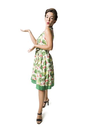 simsearch:640-01355807,k - Woman in floral dress gesturing Foto de stock - Sin royalties Premium, Código: 640-02764941