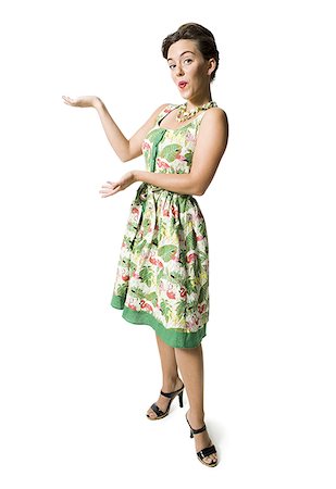 simsearch:640-01355807,k - Woman in floral dress gesturing Foto de stock - Sin royalties Premium, Código: 640-02764942