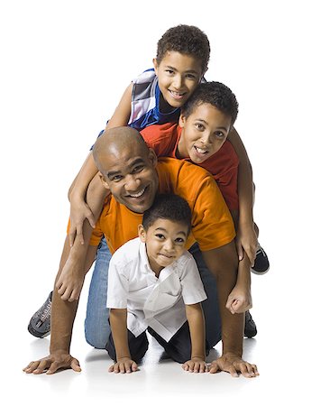 simsearch:640-03258191,k - Father posing with three sons Foto de stock - Sin royalties Premium, Código: 640-02764966