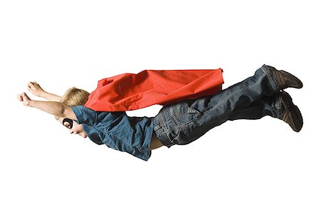 simsearch:640-02770515,k - Young boy in superhero costume Foto de stock - Royalty Free Premium, Número: 640-02764968