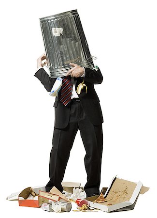 simsearch:640-01348387,k - Businessman with trash can on head Stock Photo - Premium Royalty-Free, Code: 640-02765028