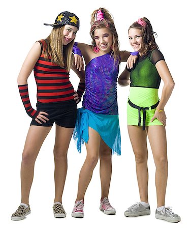 preteen girl dress skirt - Three girls posing with costumes Stock Photo - Premium Royalty-Free, Code: 640-02765031