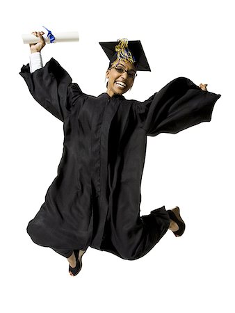 simsearch:640-01363772,k - Woman in graduation gown and Blank Sign with diploma jumping Foto de stock - Sin royalties Premium, Código: 640-02765173