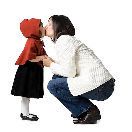 Mother daughter kissing Photographie de stock - Premium Libres de Droits, Code: 640-02765694