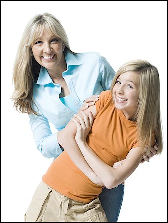 simsearch:640-02765964,k - Portrait of a mother and her daughter smiling Stock Photo - Premium Royalty-Free, Code: 640-02765923