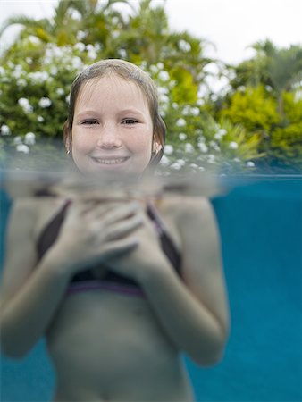 simsearch:640-02764438,k - Portrait of a girl neck deep in water Stock Photo - Premium Royalty-Free, Code: 640-02765977