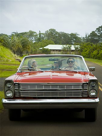 Three young women traveling in a car Stock Photo - Premium Royalty-Free, Code: 640-02766295