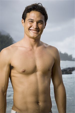 simsearch:625-01094790,k - Porträt eines jungen Mannes am Strand stehen und Lächeln Stockbilder - Premium RF Lizenzfrei, Bildnummer: 640-02766326
