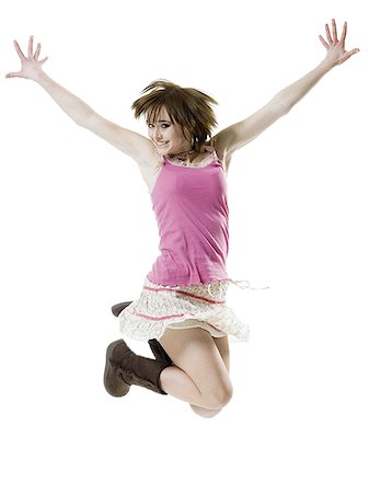 Portrait of a girl jumping Stock Photo - Premium Royalty-Free, Code: 640-02766487