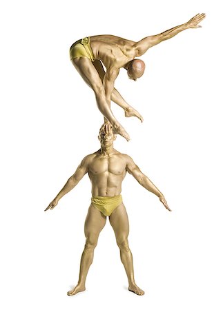 simsearch:640-02764552,k - Two male acrobats performing Foto de stock - Royalty Free Premium, Número: 640-02766642