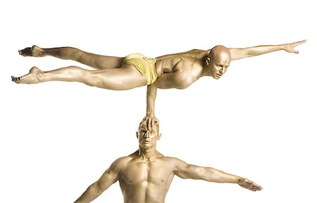 simsearch:640-01359466,k - Two male acrobats performing Stock Photo - Premium Royalty-Free, Code: 640-02766667