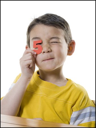 simsearch:640-01358480,k - Portrait of a boy holding a number Foto de stock - Sin royalties Premium, Código: 640-02766782