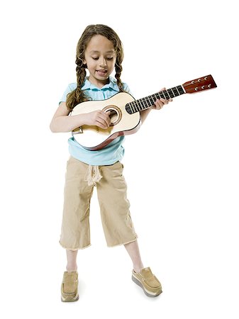 simsearch:614-08872581,k - Portrait of a girl playing the guitar Fotografie stock - Premium Royalty-Free, Codice: 640-02766822
