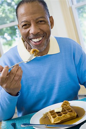 fat people eating at home - Portrait of a senior man having breakfast Stock Photo - Premium Royalty-Free, Code: 640-02766895