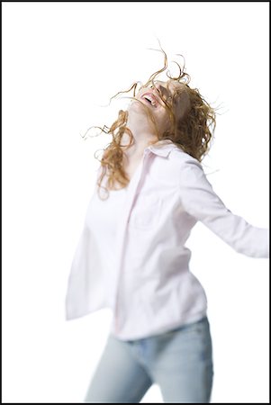 simsearch:640-02767900,k - Close-up of a young woman standing with her arms outstretched Stock Photo - Premium Royalty-Free, Code: 640-02766956