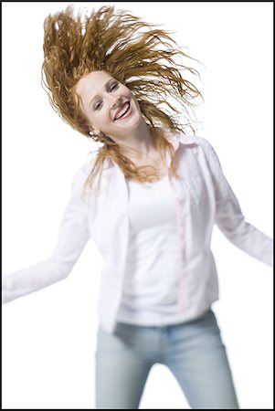 simsearch:640-02948353,k - Close-up of a young woman standing with her arms outstretched Foto de stock - Royalty Free Premium, Número: 640-02766959