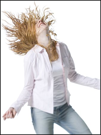 simsearch:640-02767900,k - Close-up of a young woman standing with her arms outstretched Stock Photo - Premium Royalty-Free, Code: 640-02766960