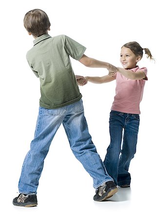 Close-up of a boy playing with his sister Stock Photo - Premium Royalty-Free, Code: 640-02766999