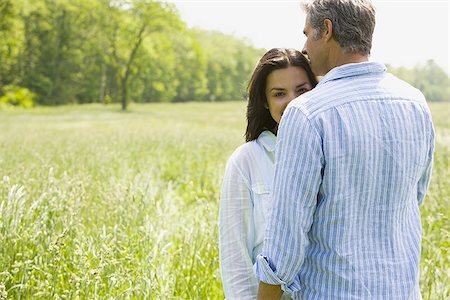 simsearch:693-06014384,k - Close-up of a man and a woman in a field Stock Photo - Premium Royalty-Free, Code: 640-02767134