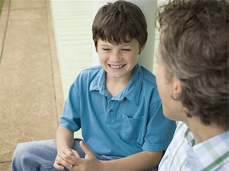 simsearch:614-07194702,k - Close-up of a boy and his father smiling Stock Photo - Premium Royalty-Free, Code: 640-02767225