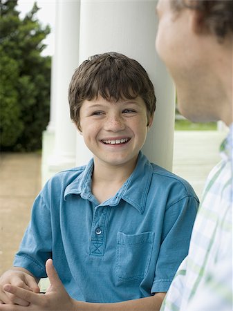 simsearch:614-07194702,k - Close-up of a boy and his father smiling Stock Photo - Premium Royalty-Free, Code: 640-02767220