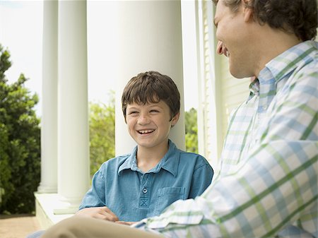 simsearch:614-07194702,k - Close-up of a boy and his father smiling Stock Photo - Premium Royalty-Free, Code: 640-02767222