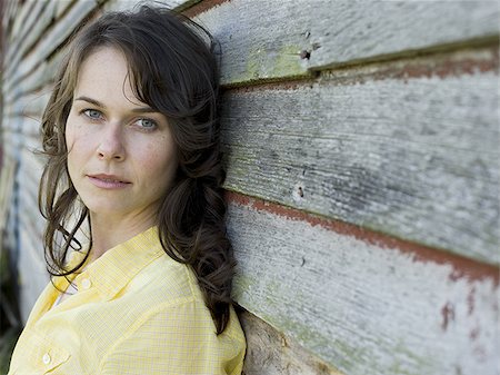 Portrait of a woman smiling Stock Photo - Premium Royalty-Free, Code: 640-02767312