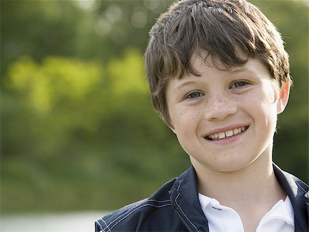 simsearch:640-02777987,k - Portrait of a boy smiling Stock Photo - Premium Royalty-Free, Code: 640-02767336