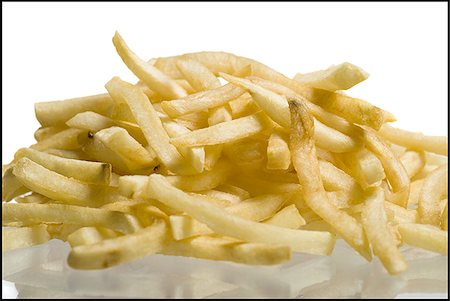 deep fry - Close-up of French fries Stock Photo - Premium Royalty-Free, Code: 640-02767405