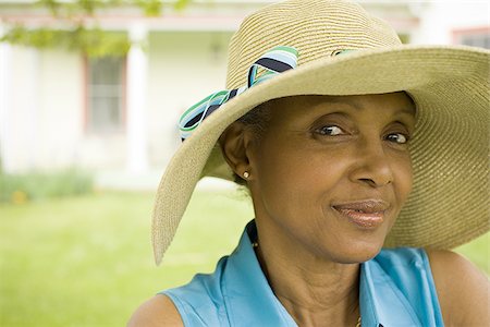 elderly black woman - Portrait of a senior woman smiling Stock Photo - Premium Royalty-Free, Code: 640-02767446