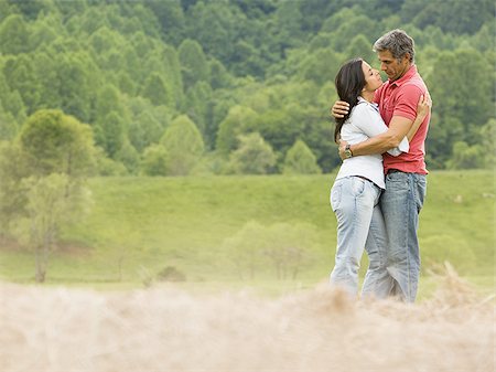 simsearch:640-01351082,k - Portrait of a man and a woman embracing each other Foto de stock - Sin royalties Premium, Código: 640-02767541