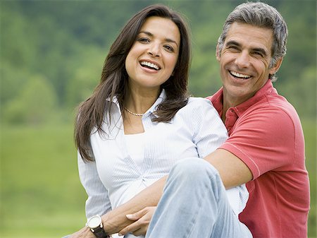 simsearch:640-01351082,k - Portrait of a man and a woman smiling Foto de stock - Sin royalties Premium, Código: 640-02767555