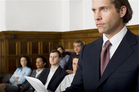 simsearch:640-01350079,k - Juror standing in a jury box and reading the verdict Stock Photo - Premium Royalty-Free, Code: 640-02767880