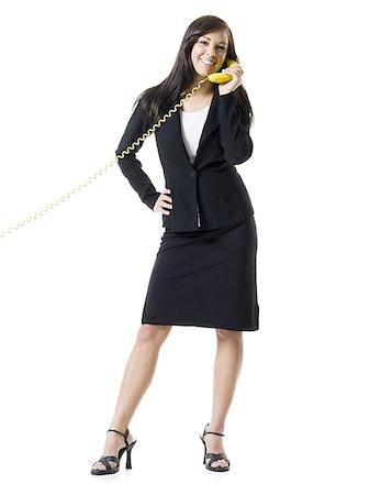 Portrait of a teenage girl talking on the telephone Stock Photo - Premium Royalty-Free, Code: 640-02768089