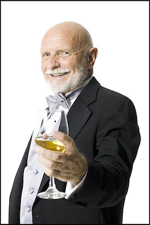 Portrait d'un homme senior tenant un verre de vin Photographie de stock - Premium Libres de Droits, Code: 640-02768191