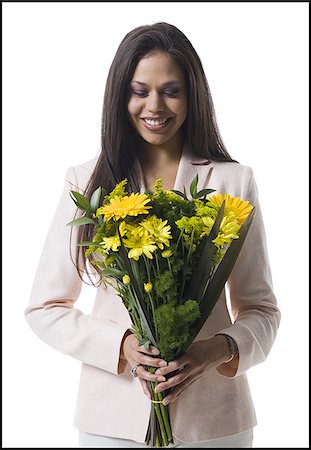 simsearch:640-02767900,k - Portrait of a young woman holding a bouquet of flowers and smiling Stock Photo - Premium Royalty-Free, Code: 640-02768390