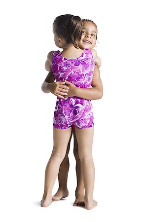 simsearch:640-01601334,k - Young female gymnasts embracing Stock Photo - Premium Royalty-Free, Code: 640-02768442