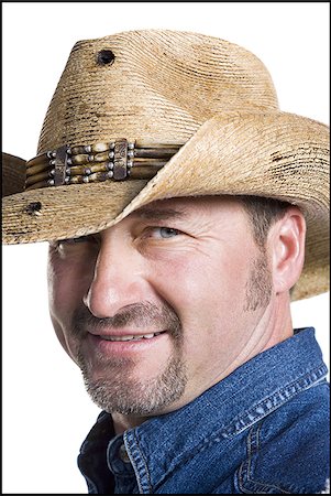 redneck facial hair - Smiling cowboy Stock Photo - Premium Royalty-Free, Code: 640-02768532