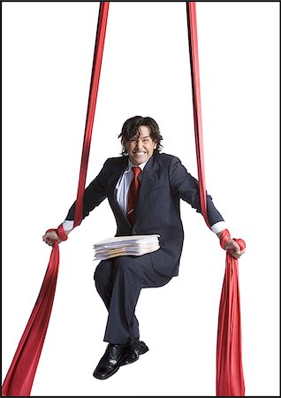 simsearch:640-01360534,k - Businessman tangled in red drapes Foto de stock - Royalty Free Premium, Número: 640-02768658