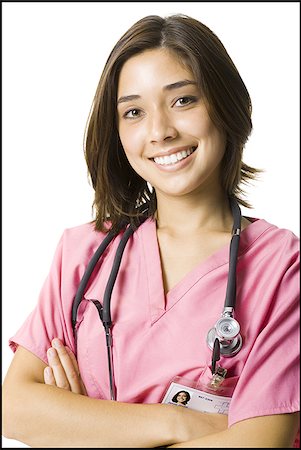 simsearch:640-02771739,k - Female doctor in pink scrubs Foto de stock - Royalty Free Premium, Número: 640-02768838