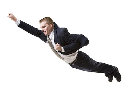 superhero business - Businessman flying through the air Foto de stock - Sin royalties Premium, Código: 640-02768907