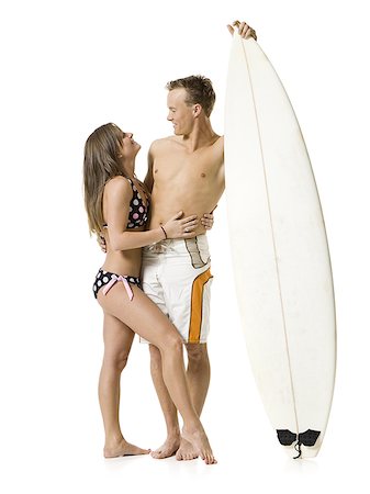 simsearch:640-02768944,k - Male and female surfer Fotografie stock - Premium Royalty-Free, Codice: 640-02768935