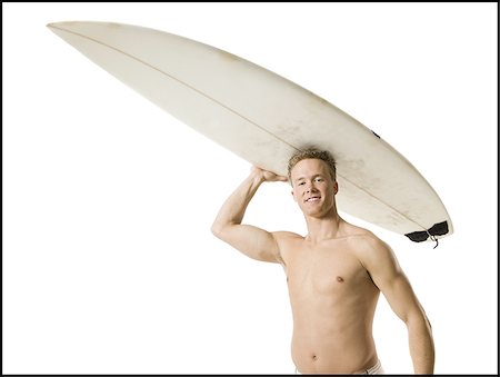 simsearch:640-02768944,k - Male surfer Fotografie stock - Premium Royalty-Free, Codice: 640-02768941